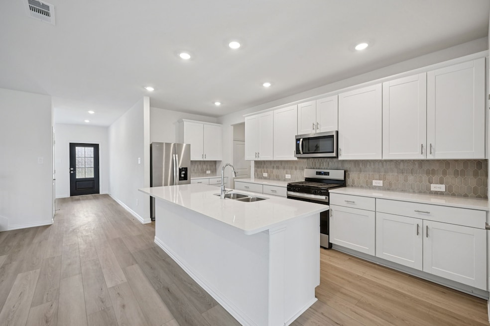 Photo is not of the actual home, but is an inspirational photo of builder’s model home and may depict options, furnishings, and/or decorator features that are not included.