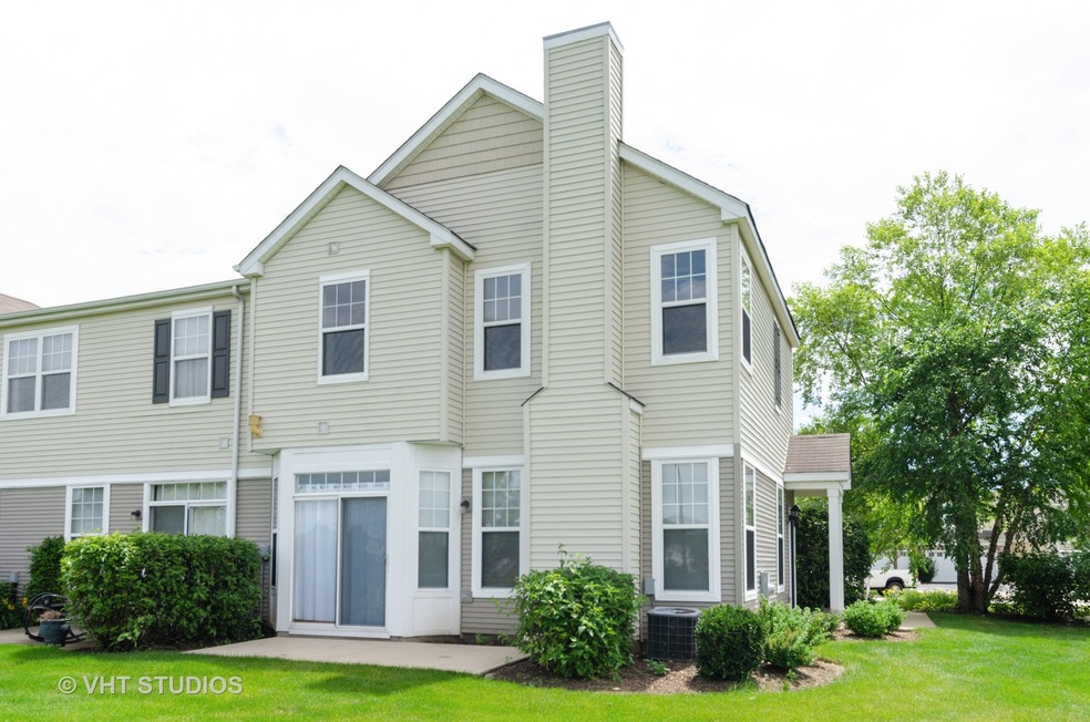 1921 Cobblestone Dr unit 431, Carpentersville, IL 60110 - photo 1