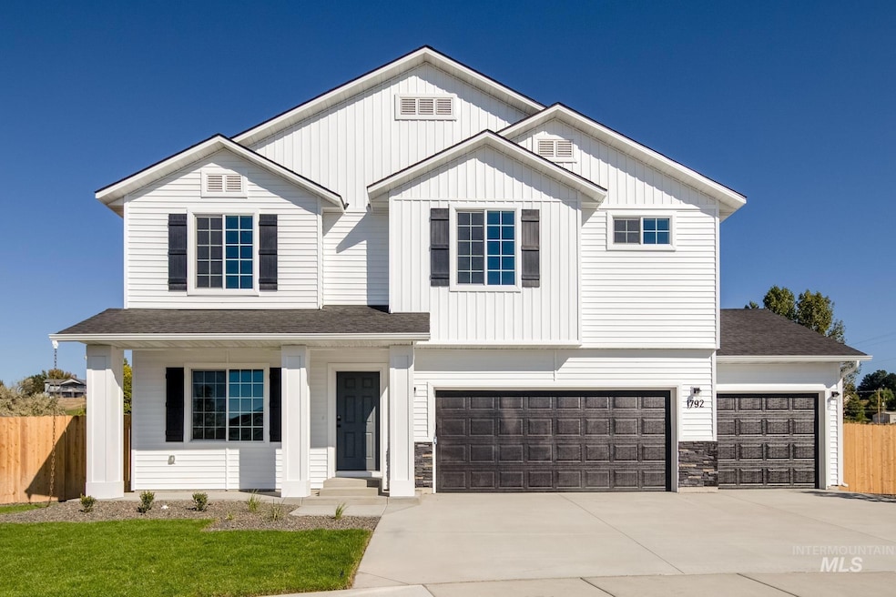 View of front facade featuring a porch, driveway, roof with shingles, board and batten siding, and a garage