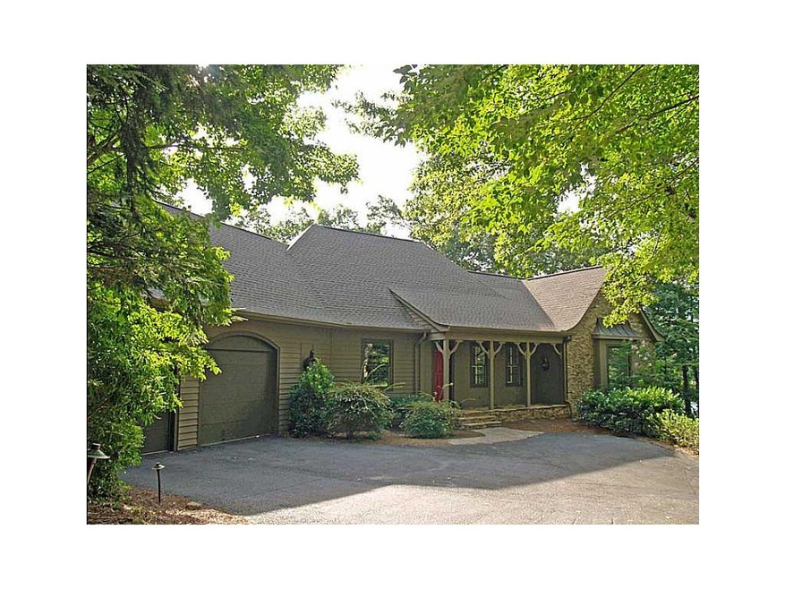 Exterior Front. Beautiful home on Lake Petit.