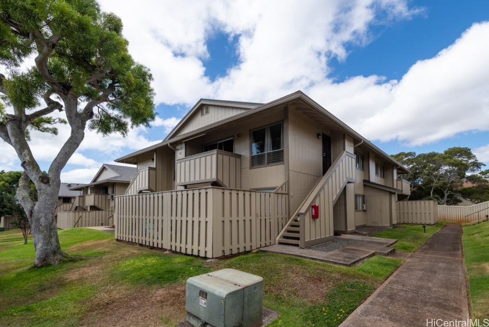 Ground floor corner unit in back, away from the pa