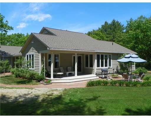 Exterior Front. Privately sited on a...