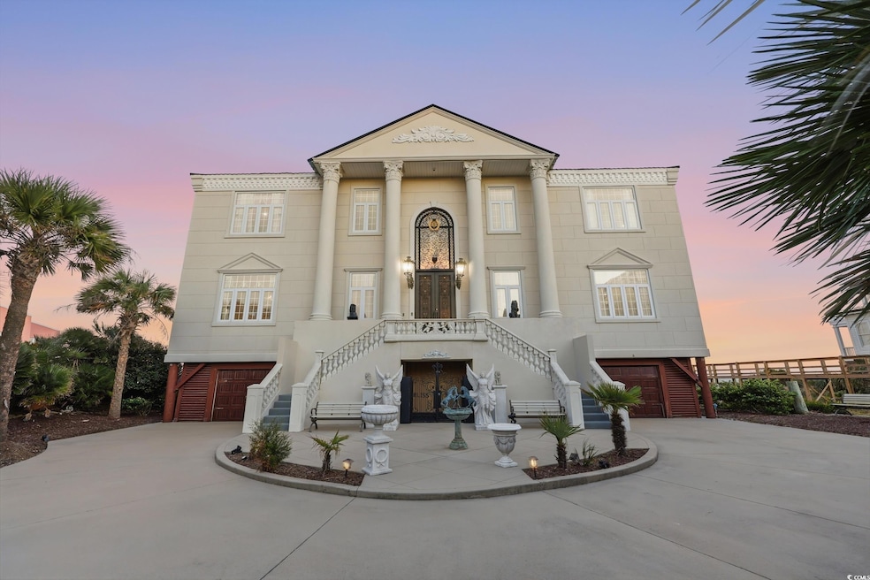 View of front of property featuring concrete driveway, a garage, and stairway