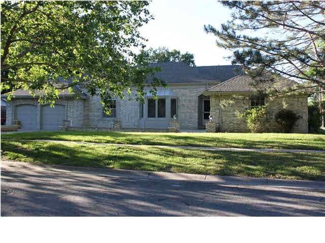 Stately curb appeal...all brick Brookhollow Ranch!