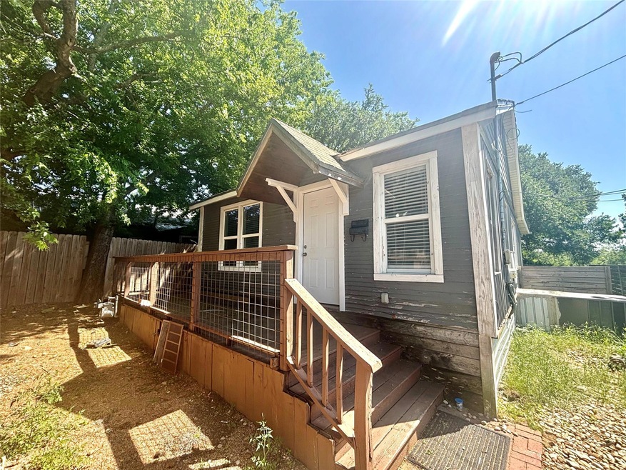 Back of property featuring fence