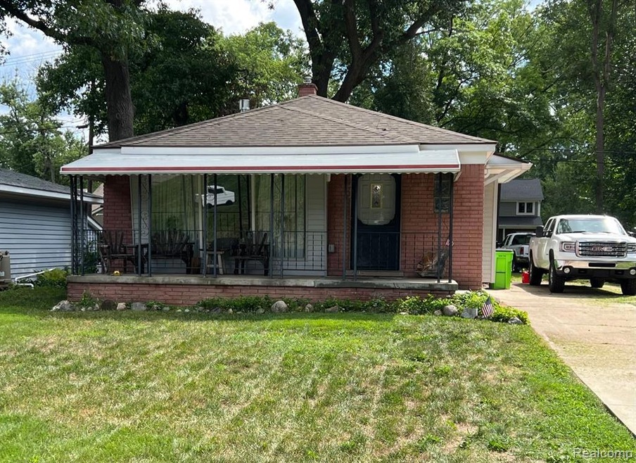 Front view  w/awning for summer shade