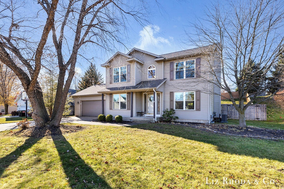 8275 Vista Royale Ln NE, Rockford, MI 49341 - photo 1