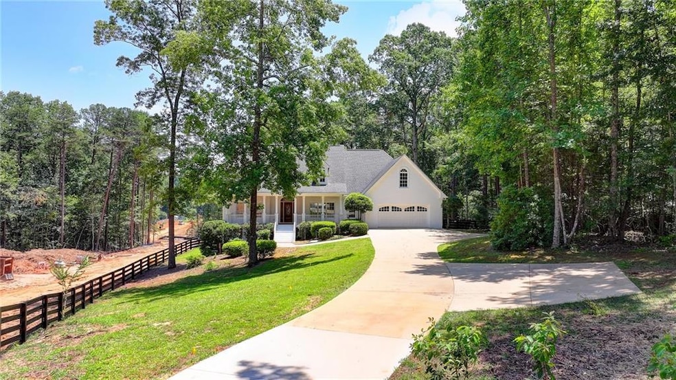 View of front of home featuring concrete driveway
