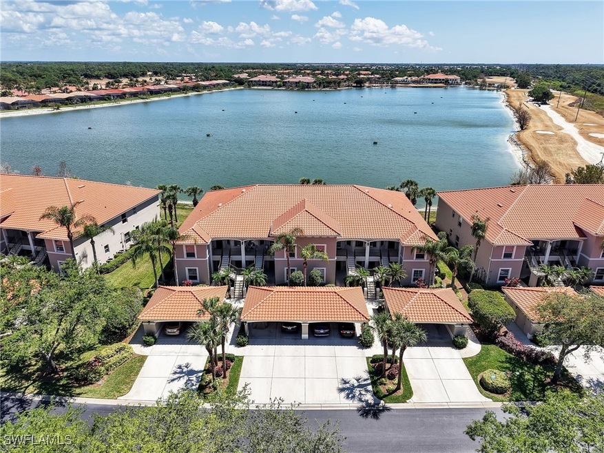 Drone / aerial view featuring a water view and a r