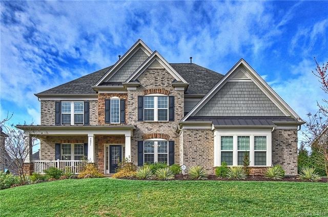 Upgraded elevation with covered front porch and si