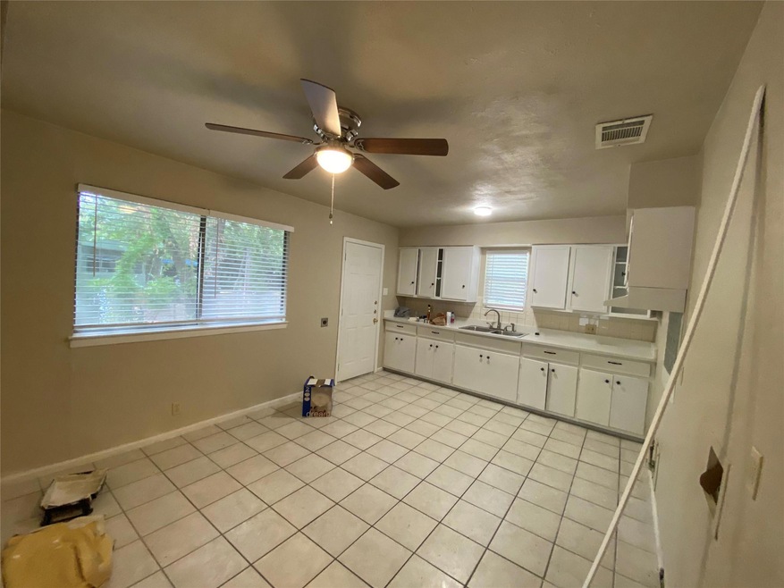 Kitchen and Breakfast room **Home interior and exterior under construction. New floors, paint, fixtures and appliances to come.**