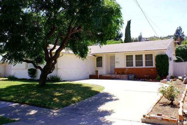 Nice curb appeal - huge shade tree makes it comfor
