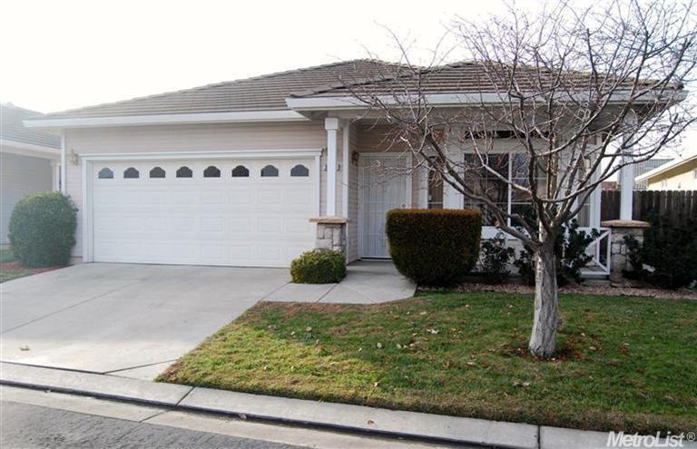 Home just down the street from clubhouse and pool