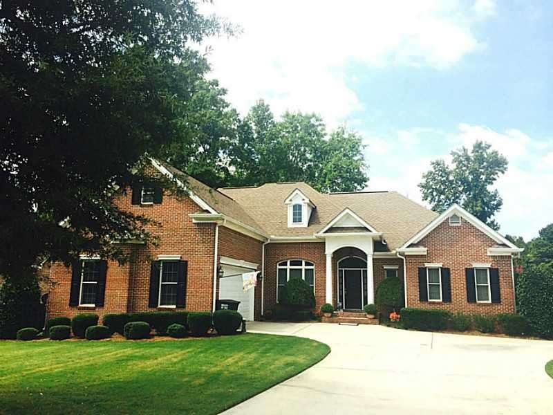 Exterior Front. Four-sided brick beauty with dual-