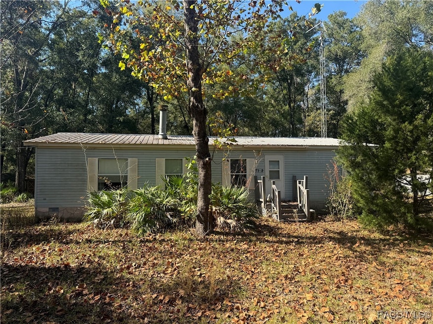 7772 N Moonwind Terrace, Dunnellon, FL 34433 - photo 1