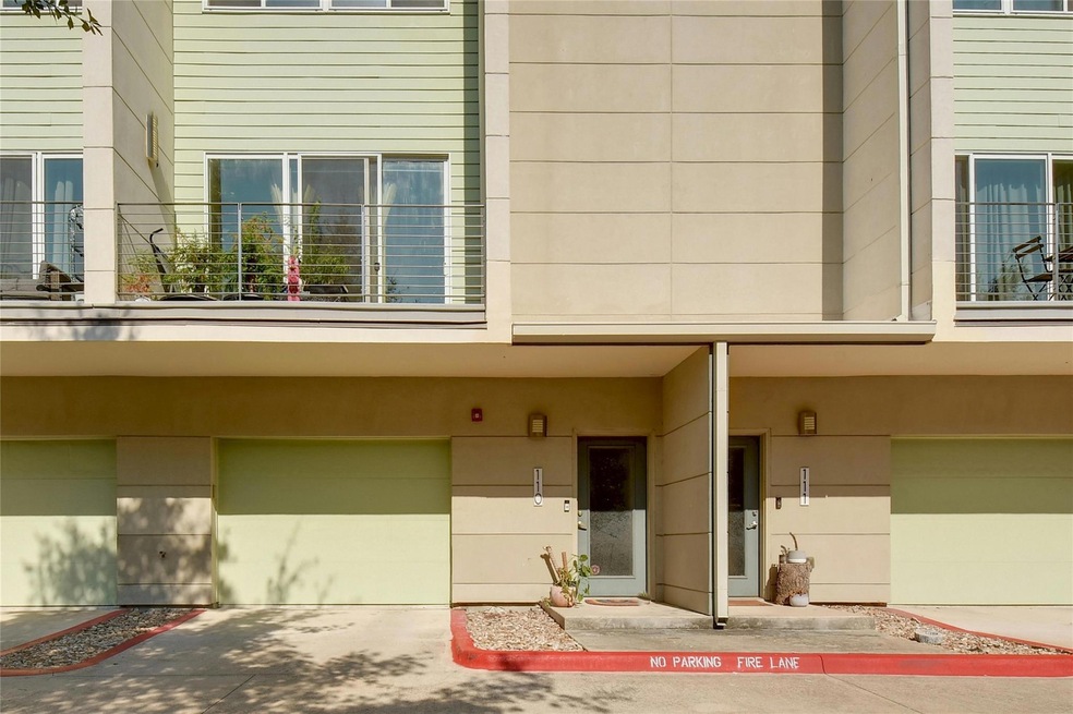 View of exterior entry featuring an attached gara