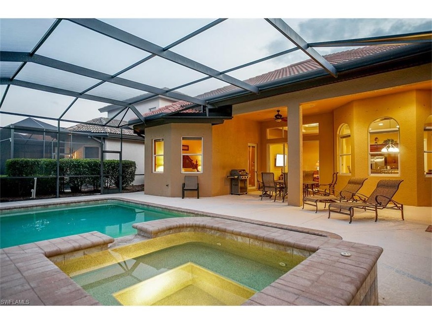 Twilight on the lanai, with lit spa/pool and lanai