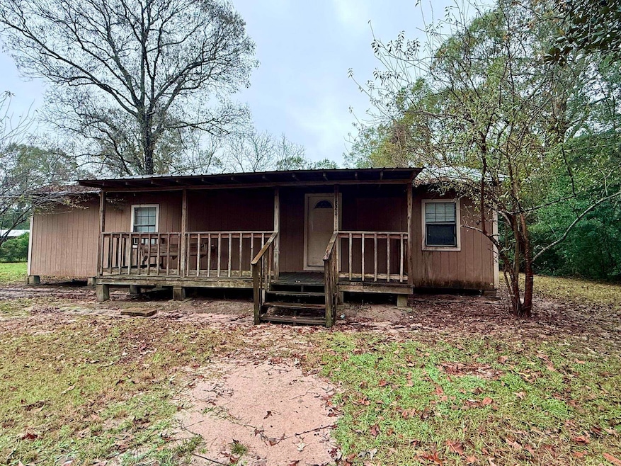 828 County Road 4550, Spurger, TX 77660 - photo 1