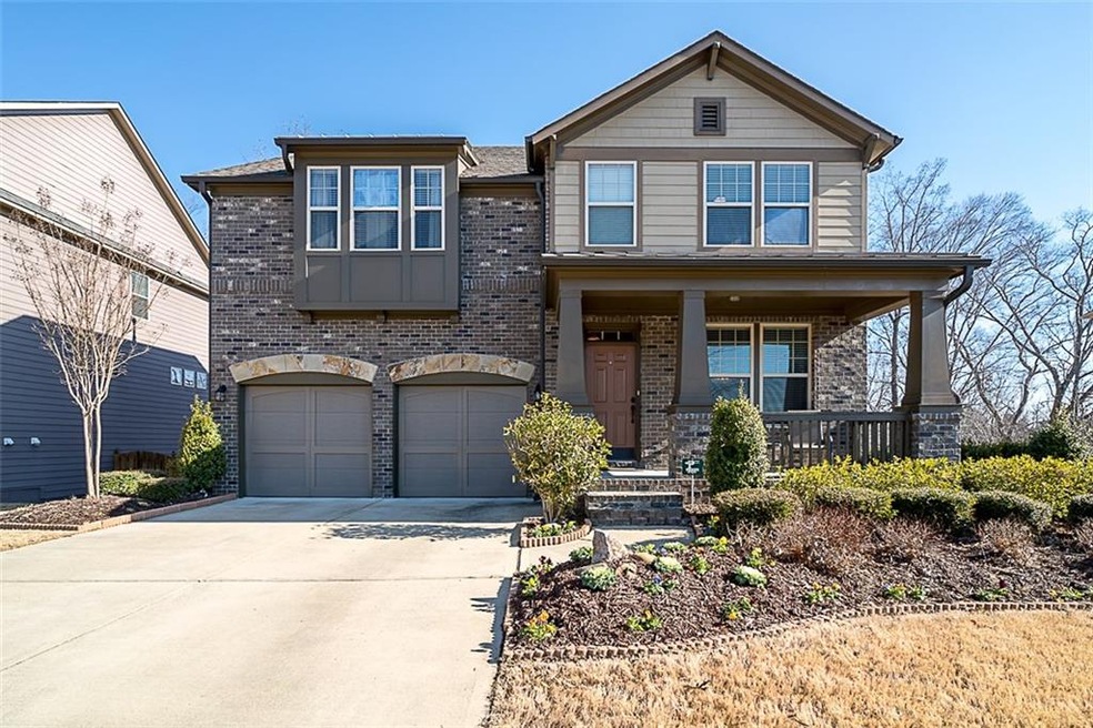 Craftsman style nearly new home by Ashton Woods. E