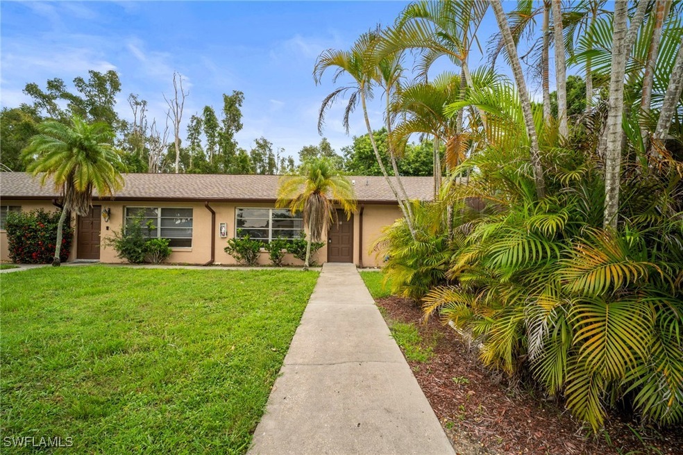 View of front of house featuring stucco siding and
