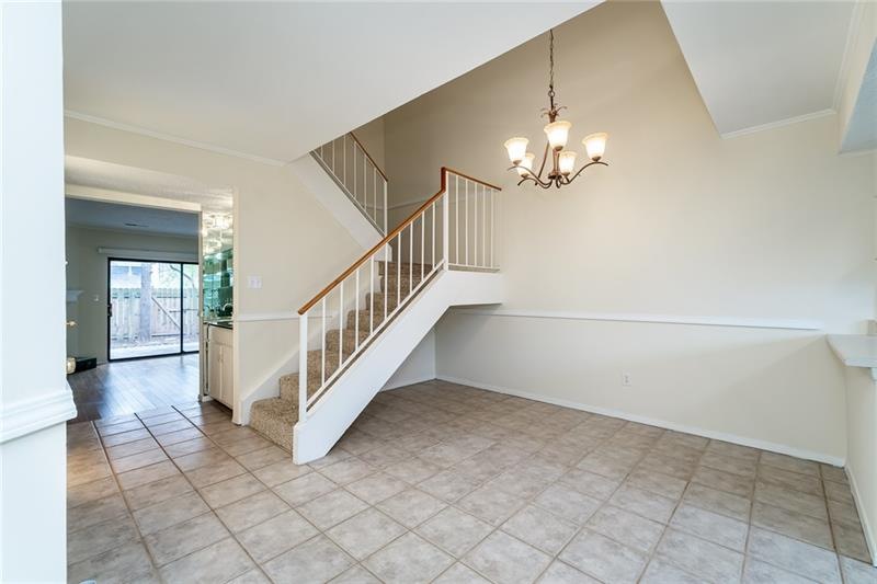 Tiled dining area with views to the kitchen and we