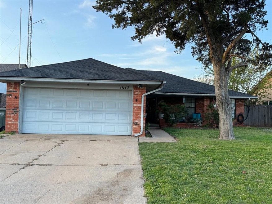 Single story home with roof with shingles, a front