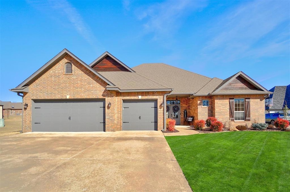 Craftsman-style house featuring brick siding, roof