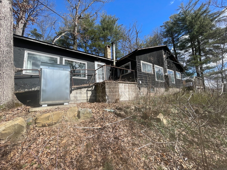 Exterior showing log and block construction