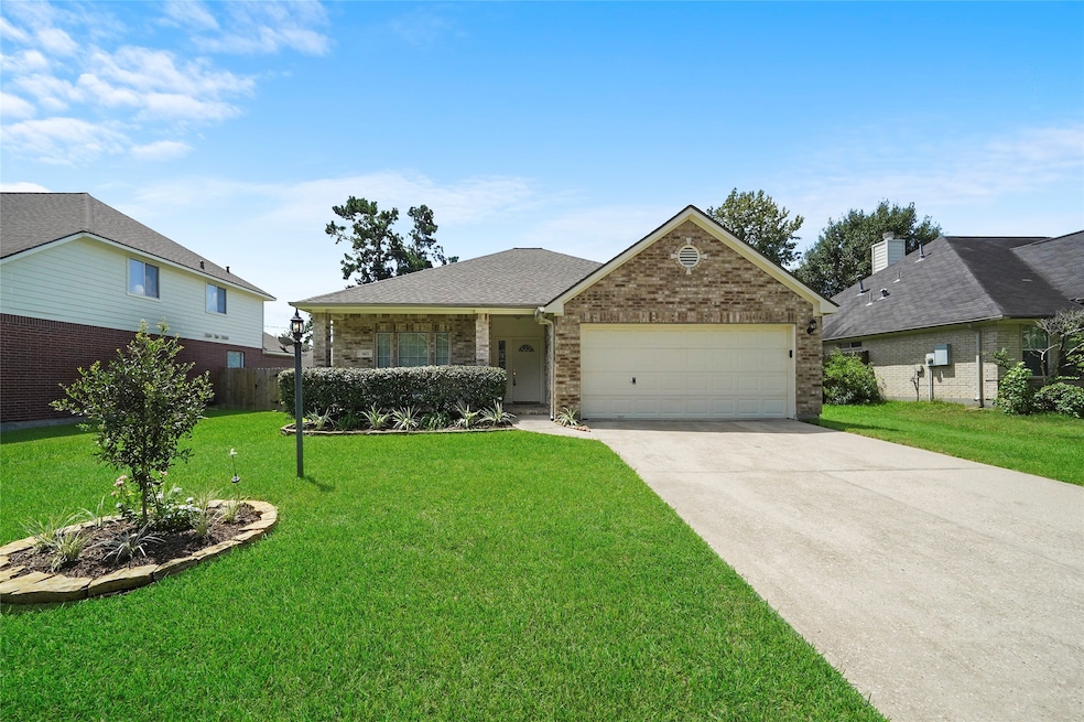 7427 Stonesfield Place, Spring, TX 77389 - photo 1