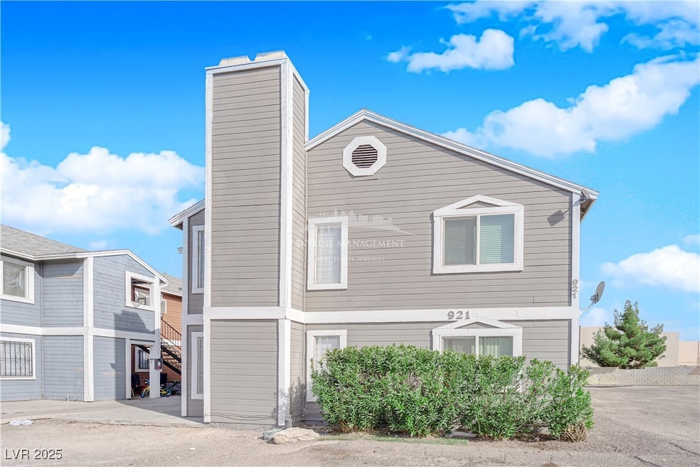 View of side of property featuring a chimney