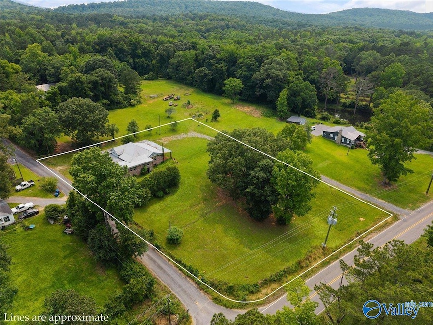 This home and acreage is in a great location just outside of a subdivision so without the restrictions. Once had 3 houses on this property and with 2 entrances that would be easy to do again. Facing Sulfur Springs Rd but also CO HWY 23. Excellent location