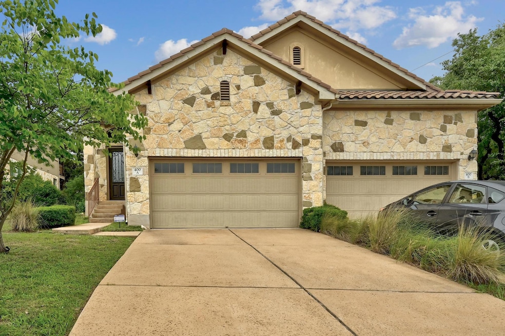 Townhome / multi-family property featuring concre