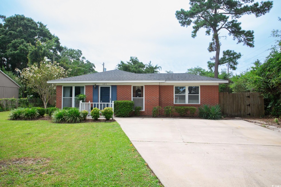 Ranch-style house with a front lawn