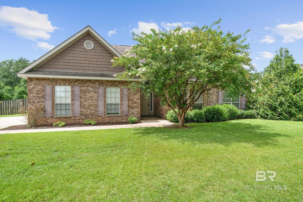 View of front of property with a front yard