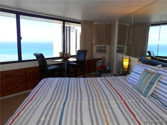 Good size room fits a cal king size bed and overlo