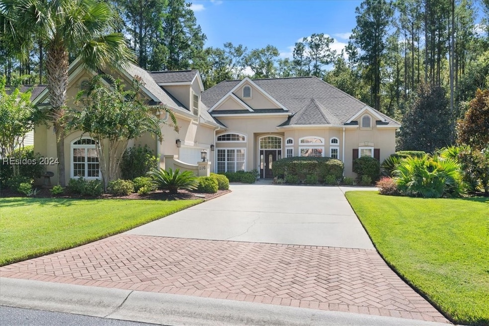 View of front of house with a front yard