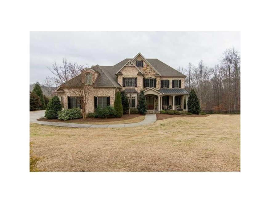 Exterior Front. Stunning 4 sided brick and stone o