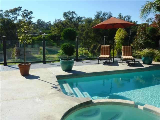 Pool with view to golf course. Very private yard