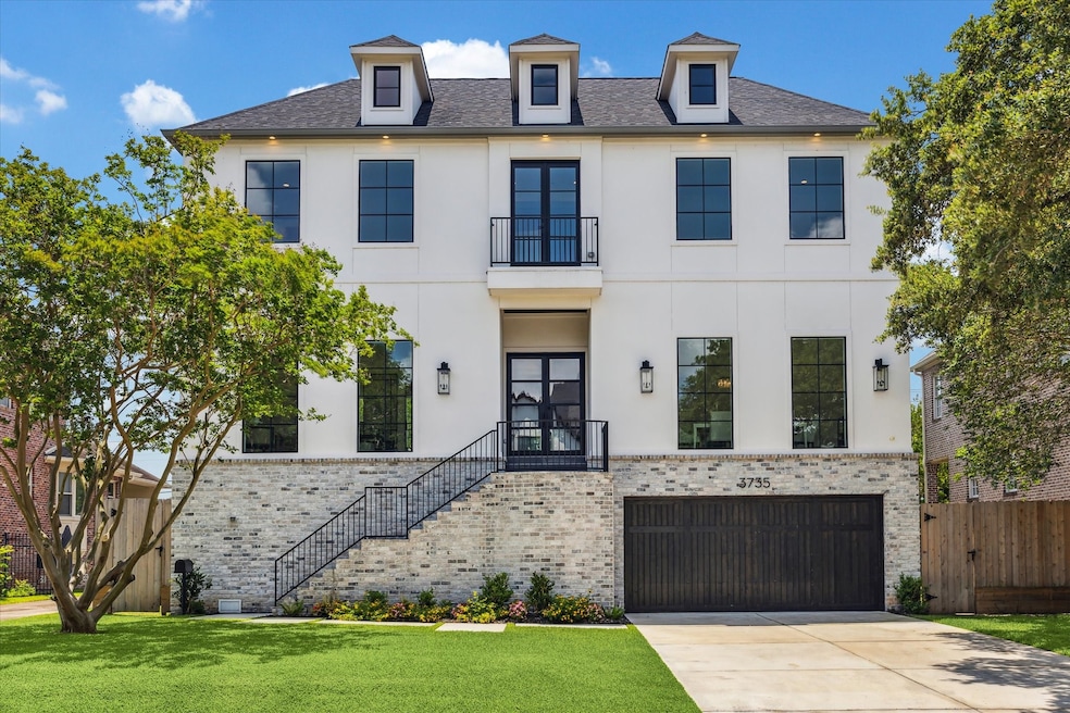 This elegant home at 3735 Tartan in Braes Heights