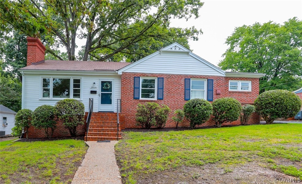 Welcome to 2808 Kenmore Rd with brick & vinyl sidi