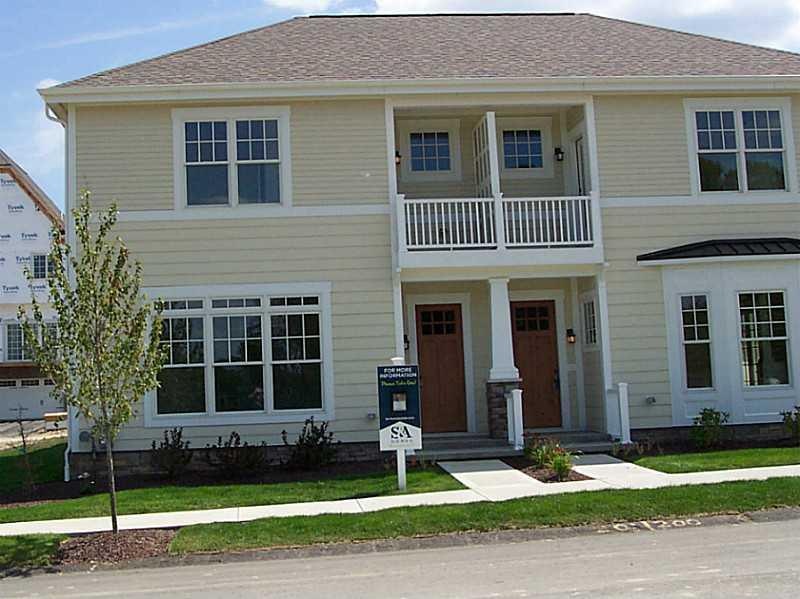Exterior Front. It is the unit on the left