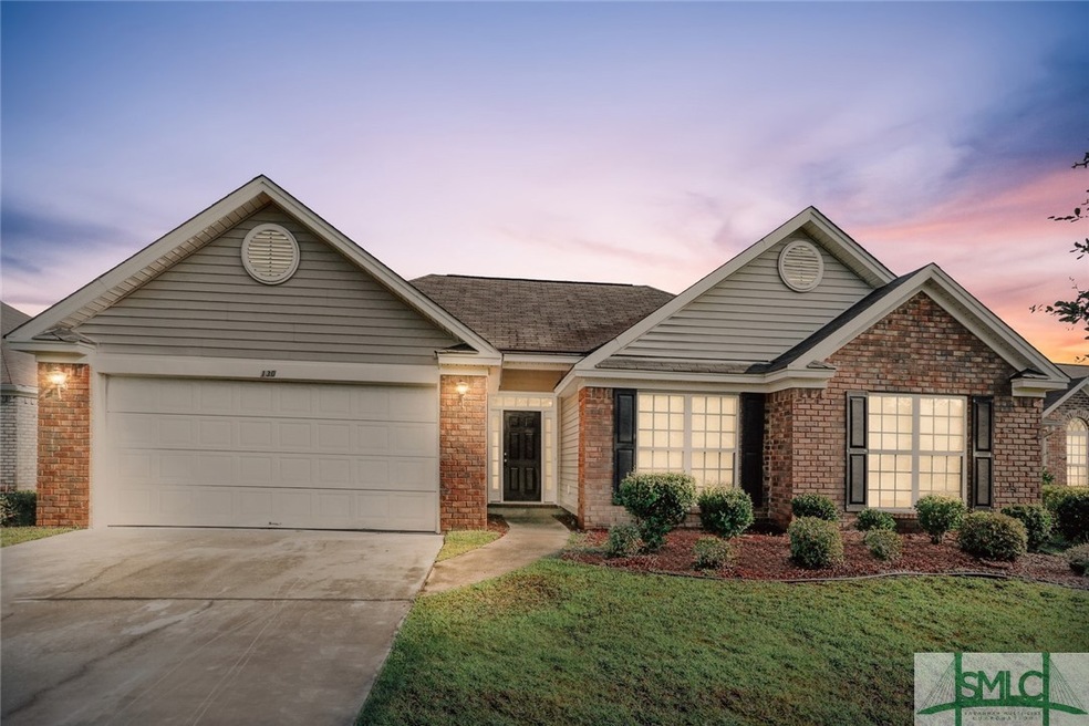 This true one-story home offers three bedrooms, tw