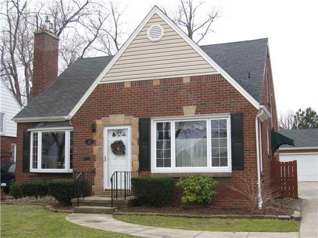 Exterior Front Charming ALL Brick expanded cape!