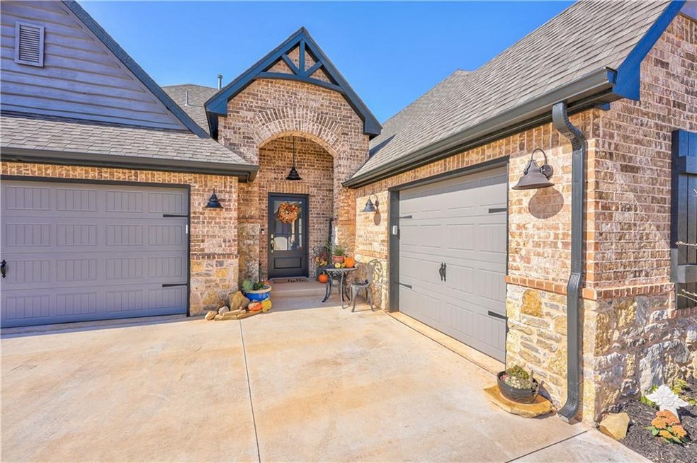 Split three car garage gives you room for storage,