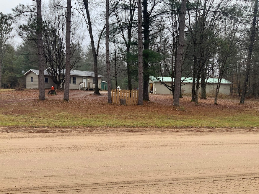 8387 E 7 Mile Rd, Luther, MI 49656 - photo 1