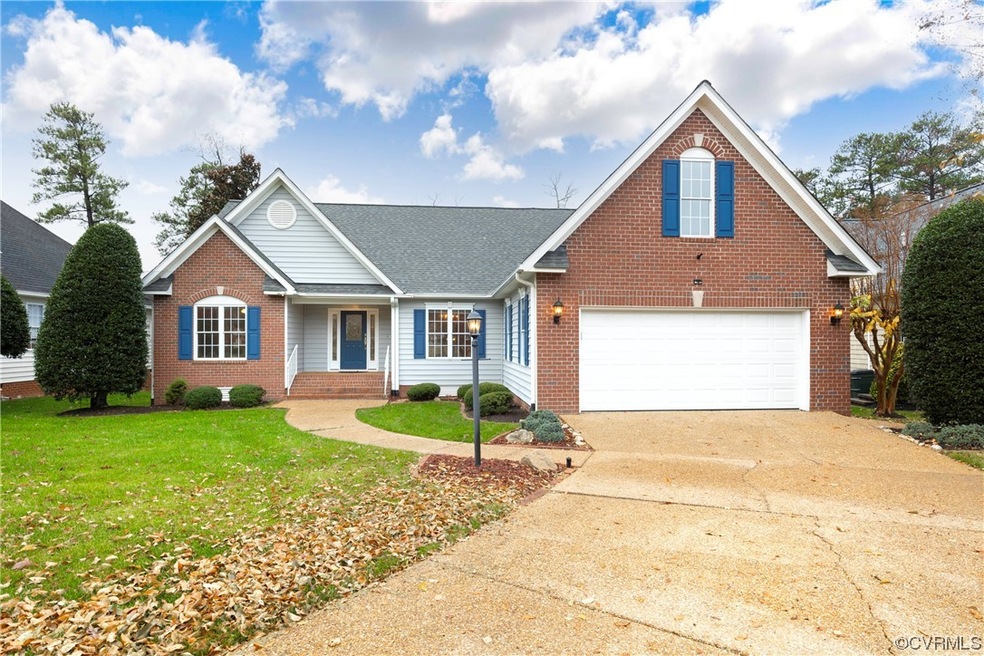 View of front of house featuring a garage and a fr