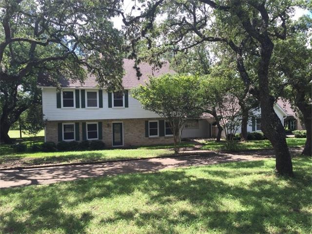 Front View with Circle Driveway and Gorgeous Oaks