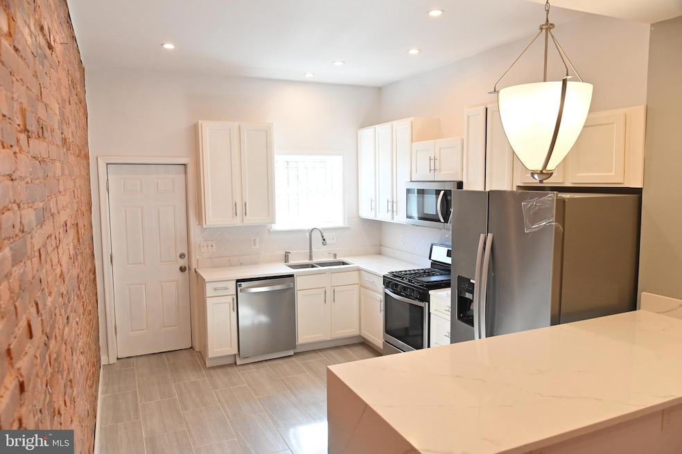 733 E 22nd St, Baltimore, MD 21218 - photo 1