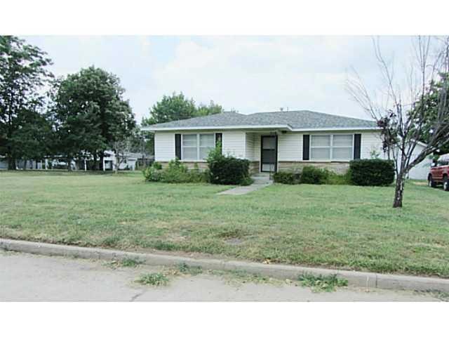 Exterior Front. Street view.  Home has brick trim.
