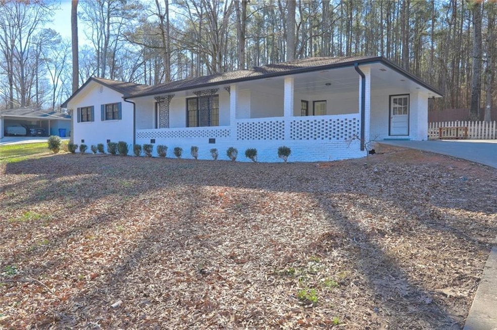 Ranch-style house featuring a porch